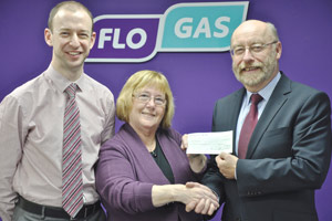 Anthony Mulligan & Paul Ruegg (on left) of  Flogas presenting a £500 cheque to Kay Taylor, Chairperson of the Belfast Samaritans, at the Flogas customer support office in Belfast on Monday 25th November 2013.